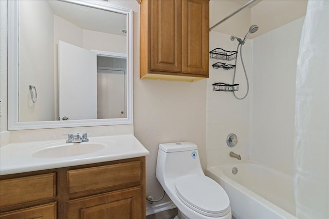 full bathroom featuring shower / bath combo with shower curtain, vanity, and toilet