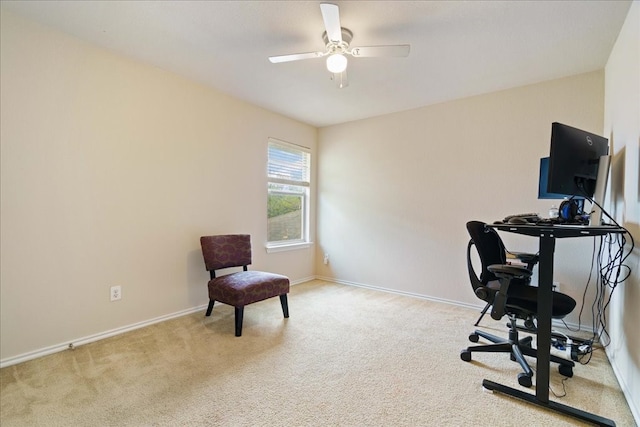 home office featuring ceiling fan and light colored carpet