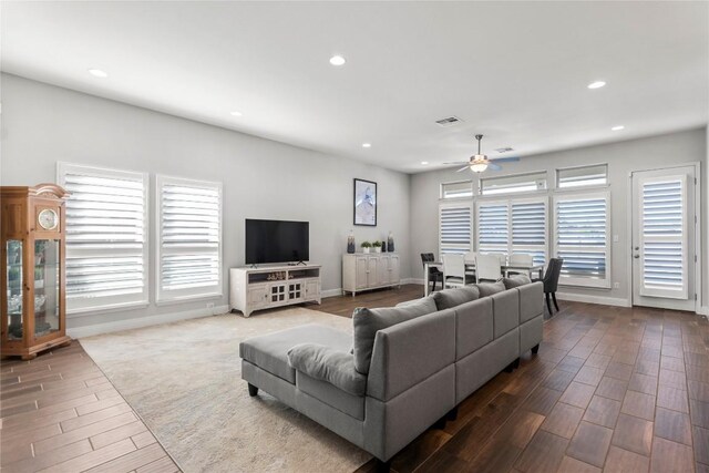 living room with dark wood-style floors, recessed lighting, and a ceiling fan
