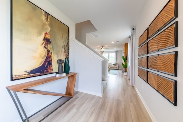 hall featuring light wood-type flooring