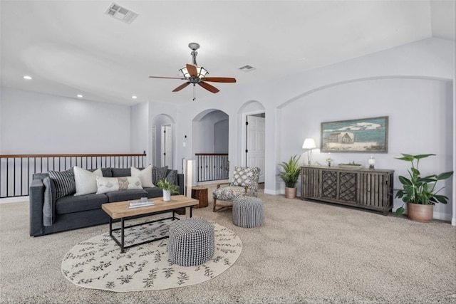 living room featuring carpet flooring and ceiling fan