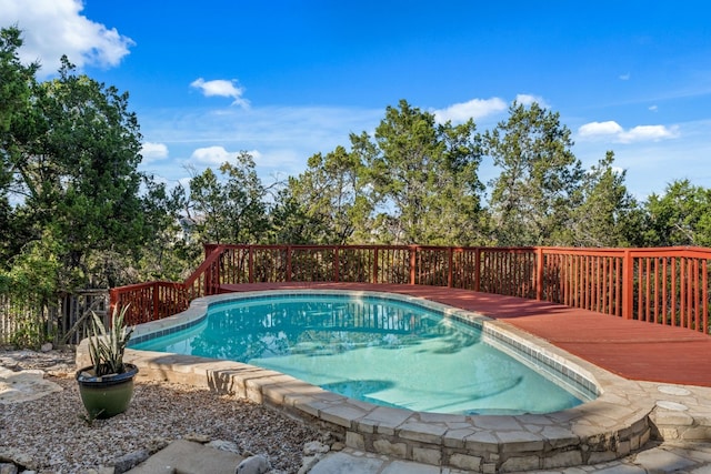 view of pool featuring a wooden deck