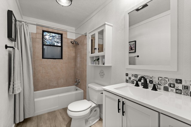 full bathroom featuring shower / bath combo, vanity, backsplash, hardwood / wood-style flooring, and a textured ceiling