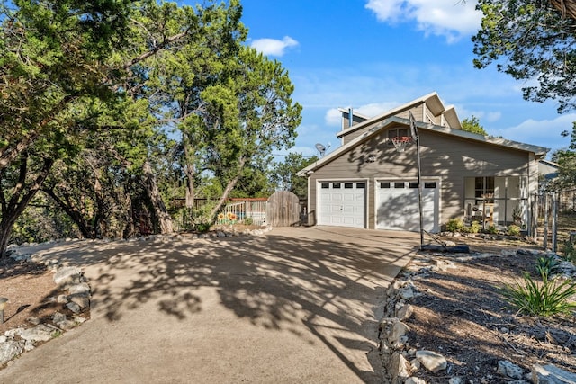 view of property exterior with a garage