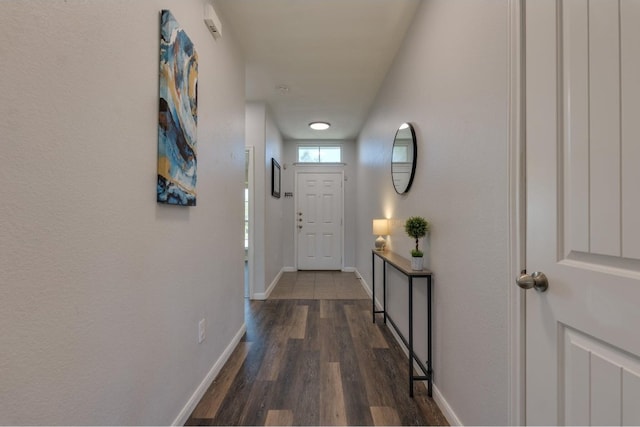 doorway to outside with dark hardwood / wood-style floors