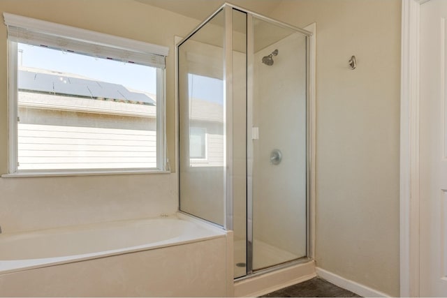 bathroom with independent shower and bath