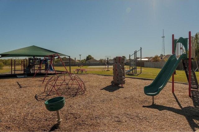 view of play area featuring a lawn