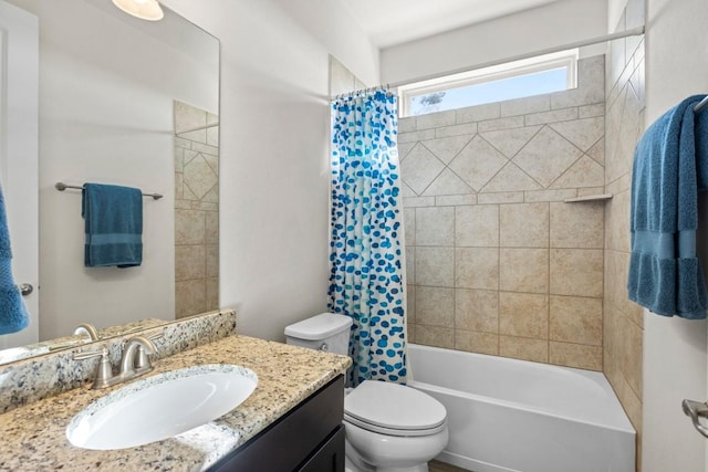 full bathroom featuring vanity, shower / bath combination with curtain, and toilet