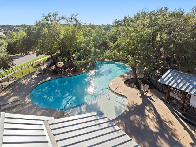 view of swimming pool with a gazebo and a patio area