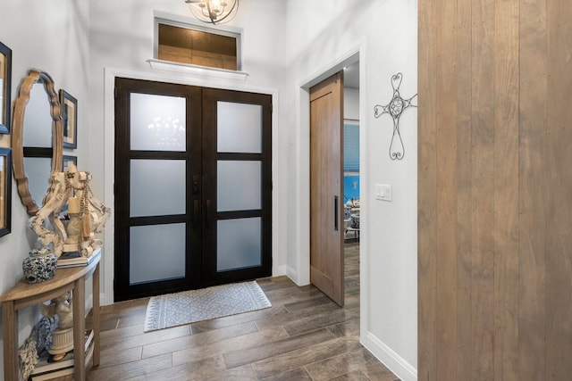 foyer featuring french doors and dark hardwood / wood-style floors