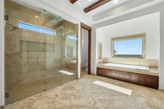 bathroom with toilet and shower with separate bathtub