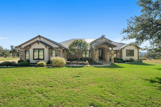 view of front of house featuring a front lawn