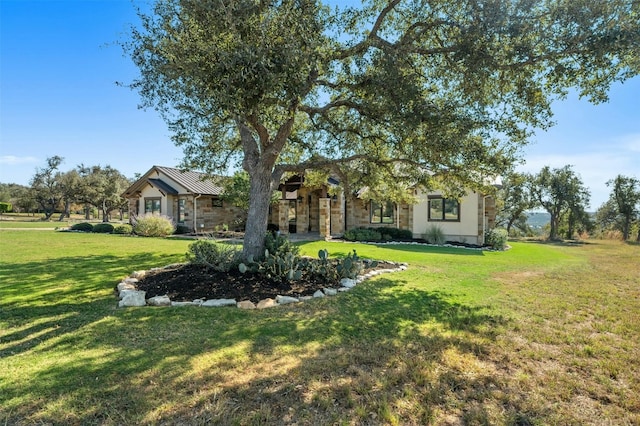 view of front facade with a front yard