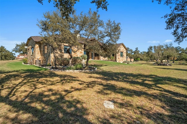 view of front of home with a front lawn