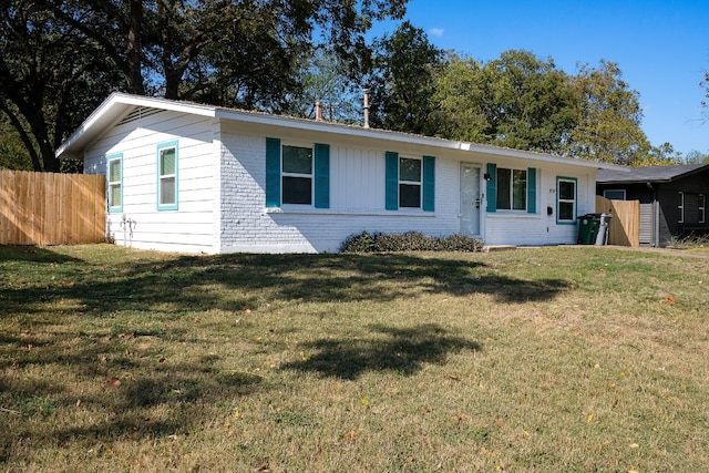 ranch-style house with a front yard