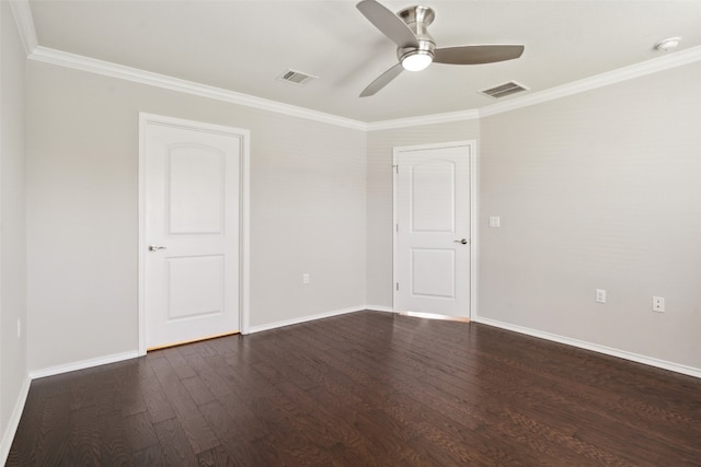 empty room with ceiling fan, dark hardwood / wood-style flooring, and ornamental molding