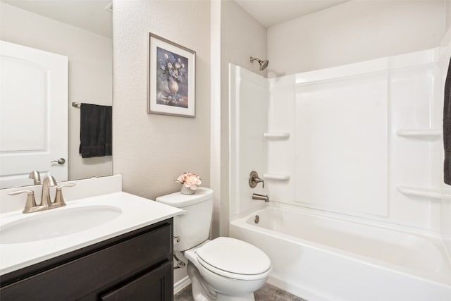 full bathroom with bathtub / shower combination, vanity, and toilet