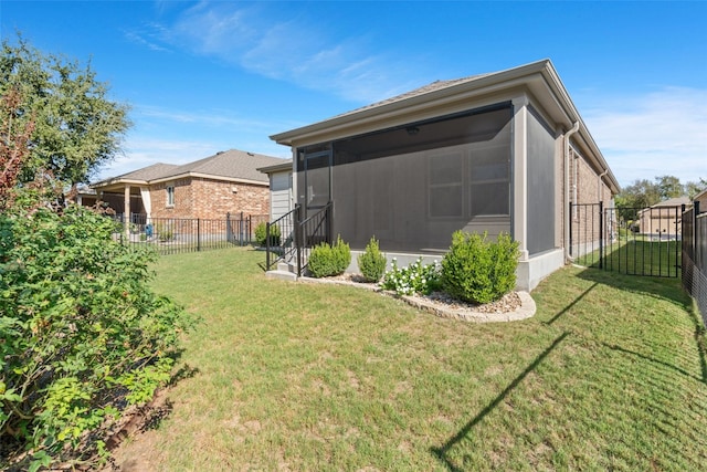 view of yard with a sunroom