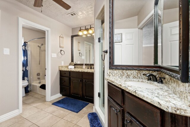 full bathroom featuring tile patterned flooring, a textured ceiling, decorative backsplash, shower / bath combo with shower curtain, and vanity