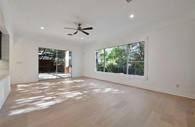 unfurnished room with light hardwood / wood-style floors and ceiling fan