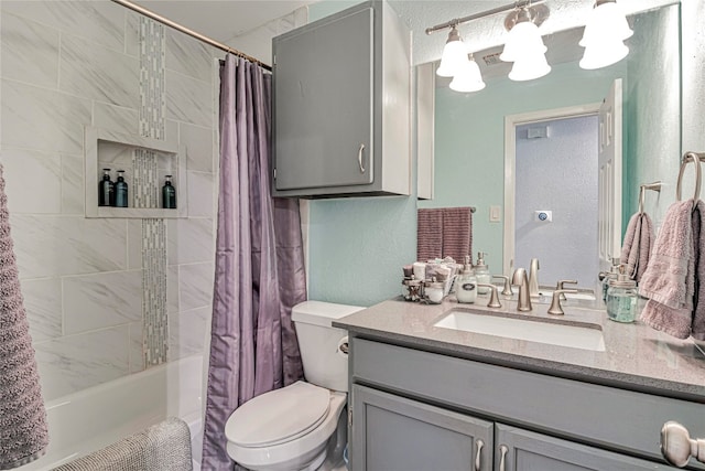 full bathroom with shower / tub combo with curtain, vanity, and toilet