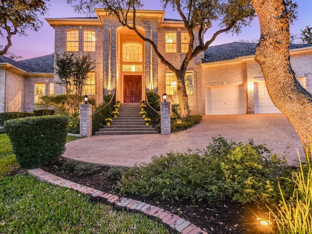 view of front of property featuring a garage