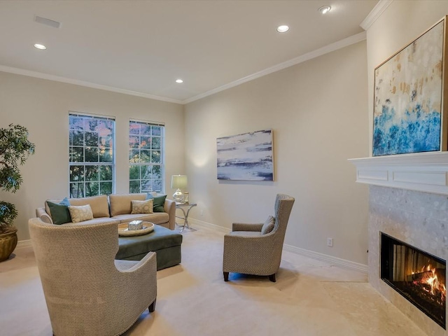 carpeted living room featuring ornamental molding and a fireplace