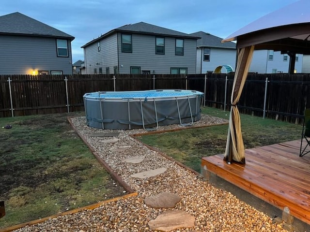 view of yard featuring a pool side deck