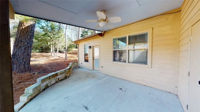 view of patio featuring ceiling fan