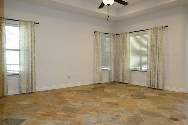 empty room featuring ceiling fan