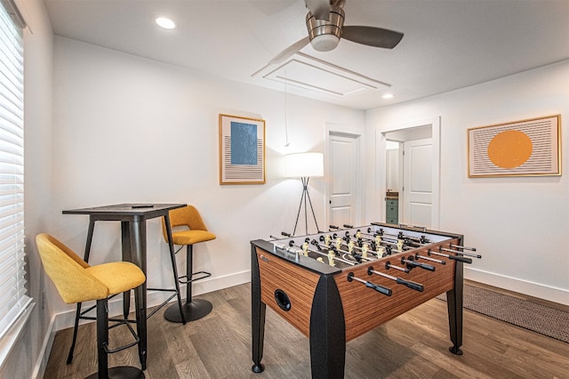 game room with hardwood / wood-style flooring and ceiling fan