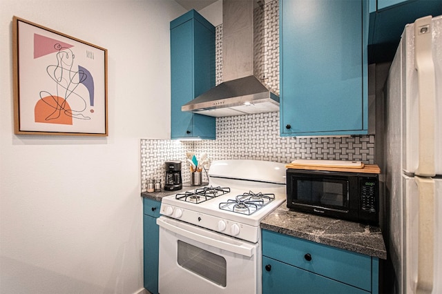 kitchen featuring blue cabinetry, decorative backsplash, wall chimney exhaust hood, and white appliances