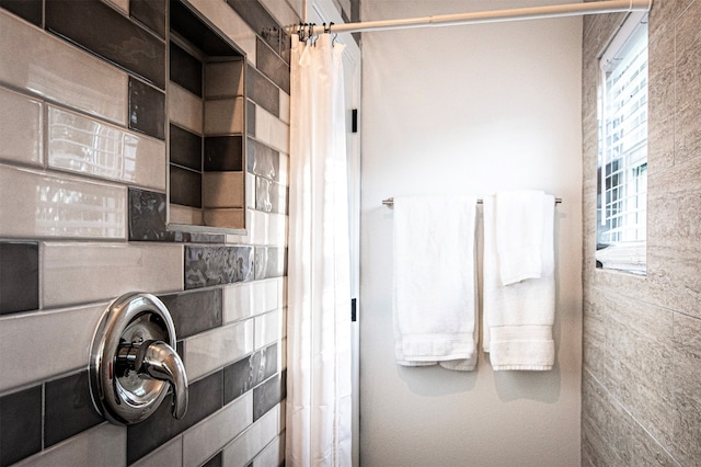 bathroom with curtained shower