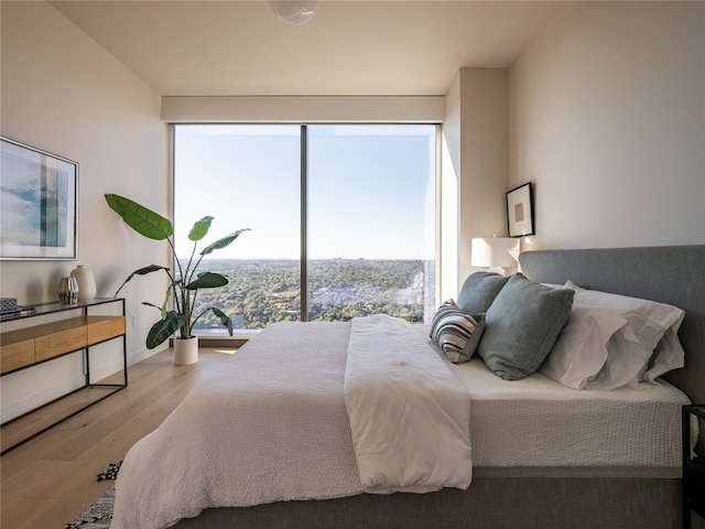 bedroom featuring wood finished floors