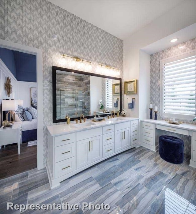 bathroom featuring hardwood / wood-style floors and vanity