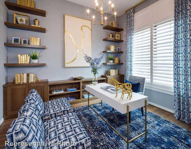 office area with hardwood / wood-style floors and a chandelier