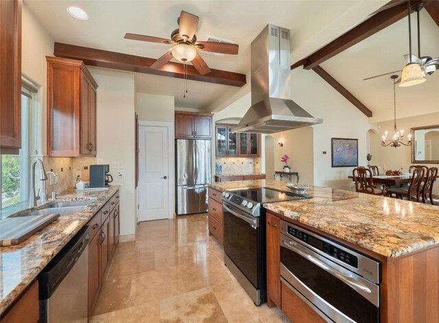 kitchen with stainless steel appliances, island exhaust hood, sink, and light stone counters