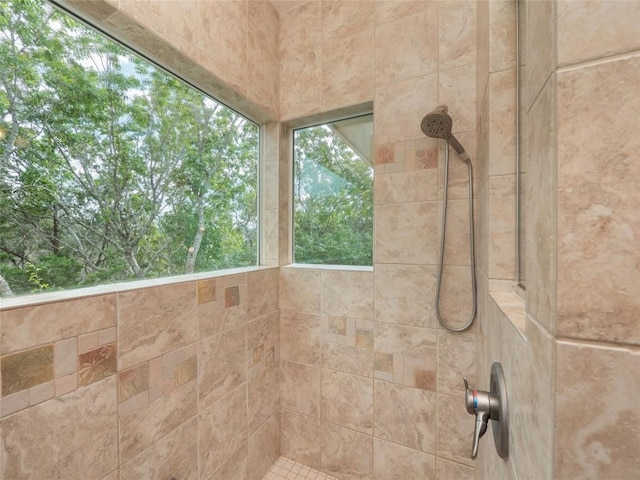 details featuring a tile shower