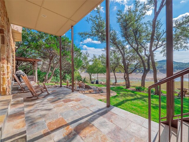 view of patio / terrace with a mountain view