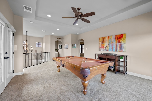 rec room featuring carpet, ceiling fan with notable chandelier, a raised ceiling, and billiards