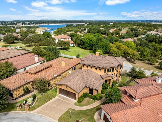 bird's eye view with a water view