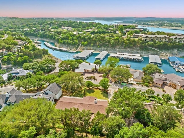 aerial view at dusk with a water view