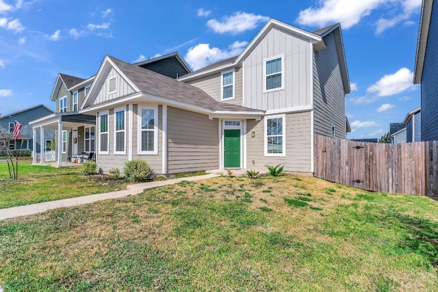 view of front of house featuring a front lawn and a porch