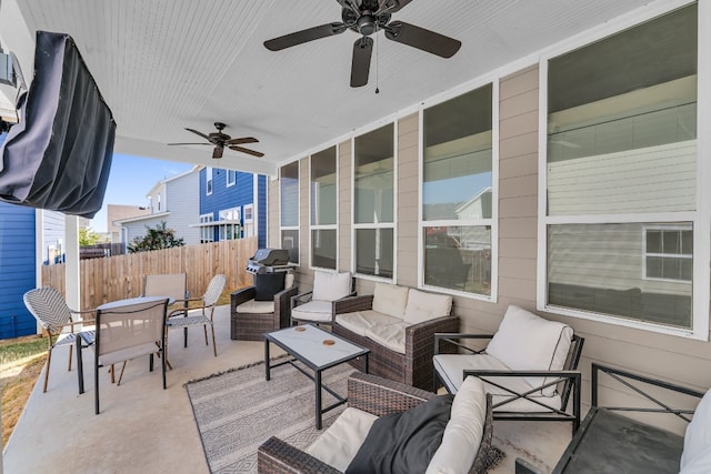 view of patio with grilling area, ceiling fan, and an outdoor hangout area