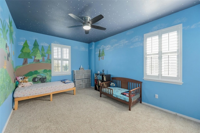 bedroom featuring ceiling fan and carpet flooring