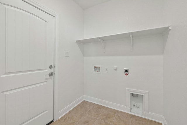 clothes washing area featuring hookup for an electric dryer, hookup for a washing machine, light tile patterned floors, and hookup for a gas dryer