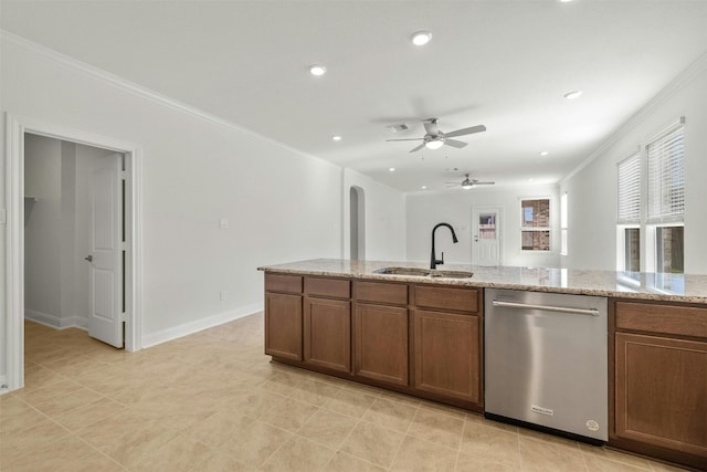 kitchen featuring ceiling fan, dishwasher, light stone countertops, sink, and crown molding