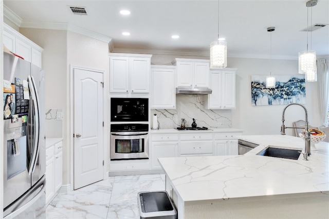 kitchen featuring white cabinetry, sink, light stone countertops, hanging light fixtures, and stainless steel appliances