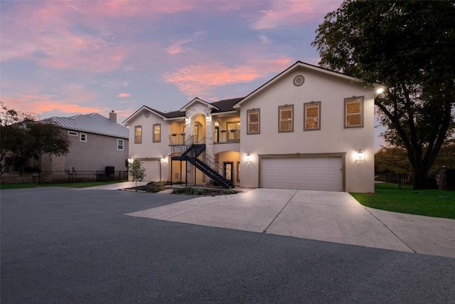 view of front of property with a garage