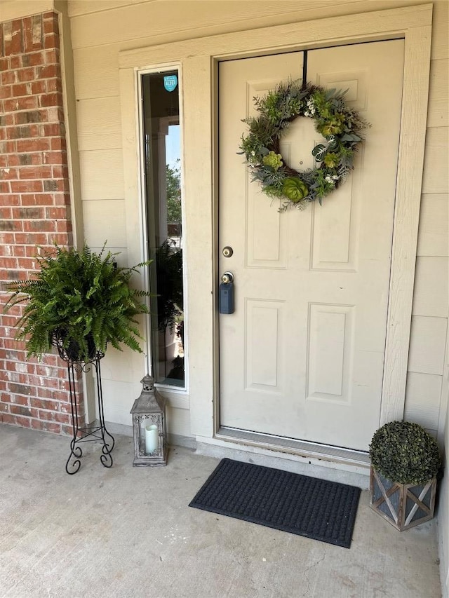 3104 Tyler Ln, Taylor, TX 76574 - view of exterior entry with brick siding